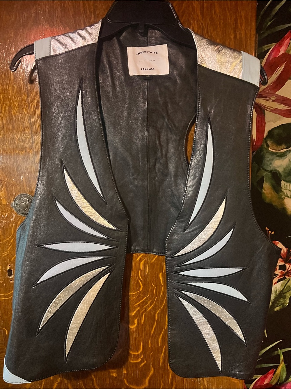 Understated Leather Black Vest with Silver & Light Blue Appliqué